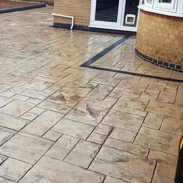 Buff ashlar-print imprinted concrete patio