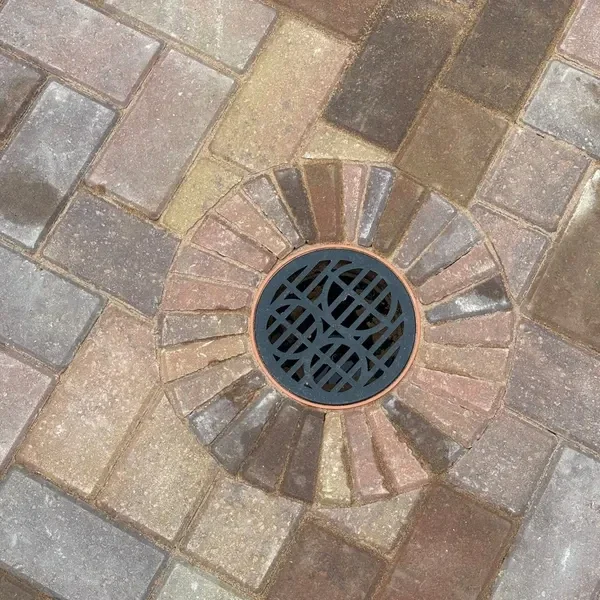 Block paving around a drainage gully