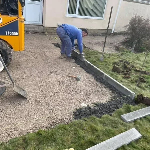 Kerbs being bedded along a new driveway