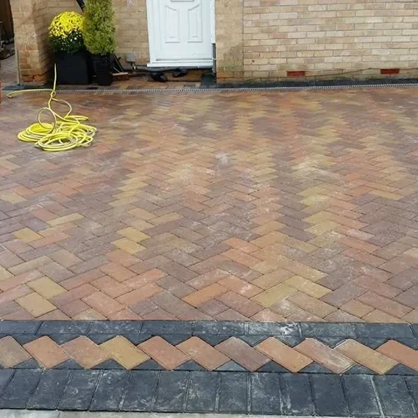Block paving with a contrasting triangular border