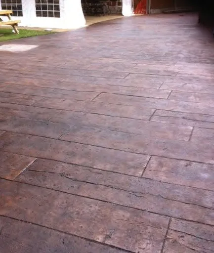 Reclaimed timber plank, photo of imprinted concrete