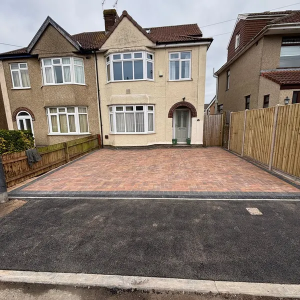 Brindle block paving driveway in front of a semi-detached house