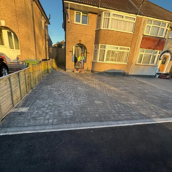 Charcoal block paving driveway at sunset