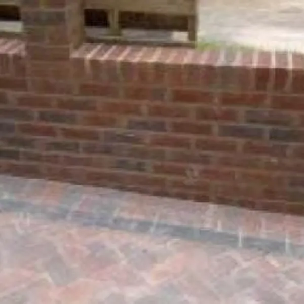 Brick boundary wall with a pier