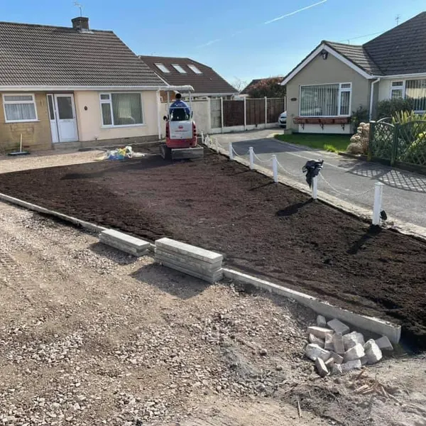 Edging kerbs set on a new sub-base