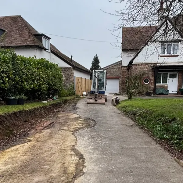 Old driveway being broken out