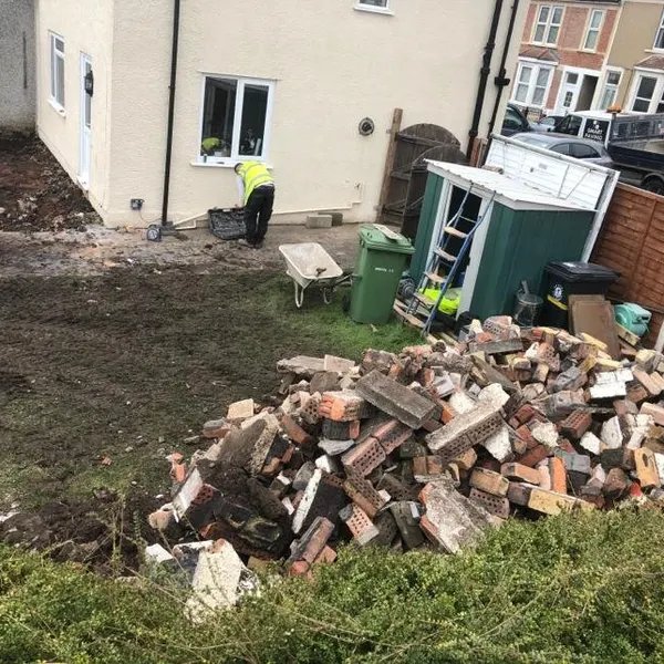 Old surface lifted and stacked for removal
