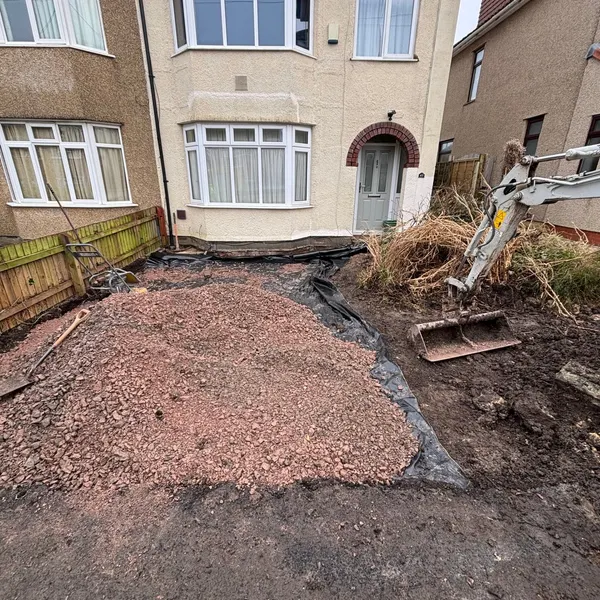 Excavated front garden ready for a new drive