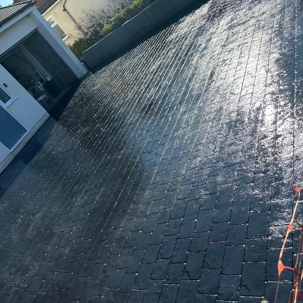 Dark cobble-print imprinted concrete