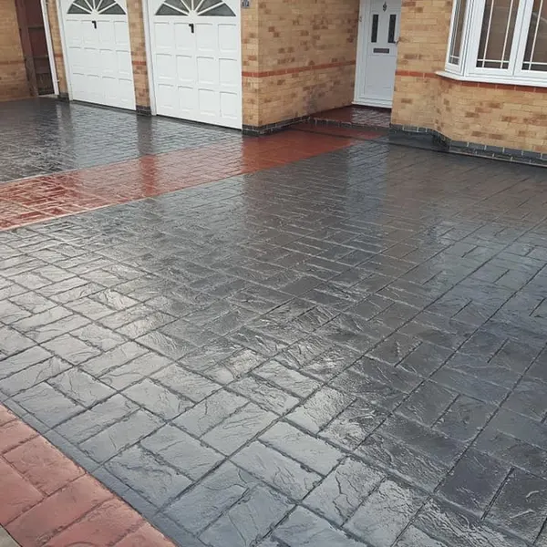 Charcoal imprinted concrete with a red border