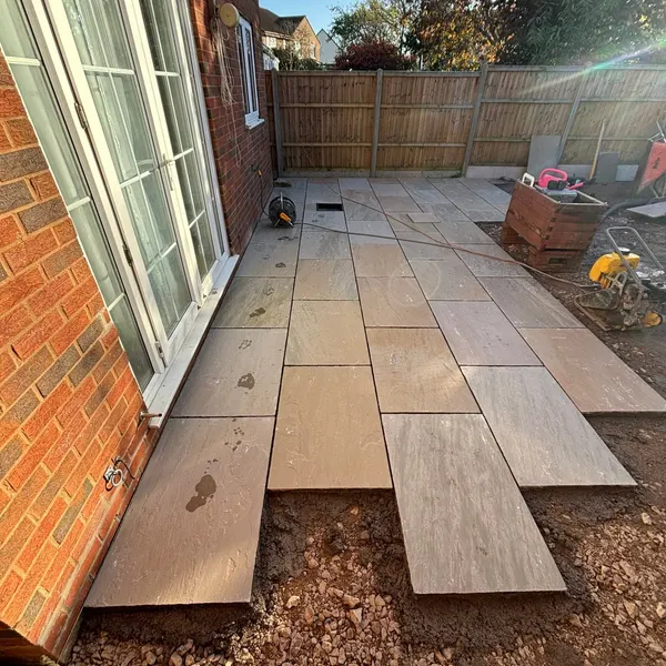 Wood-effect porcelain planks being laid