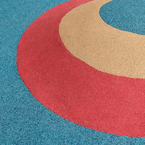 Red, buff and blue wetpour shapes